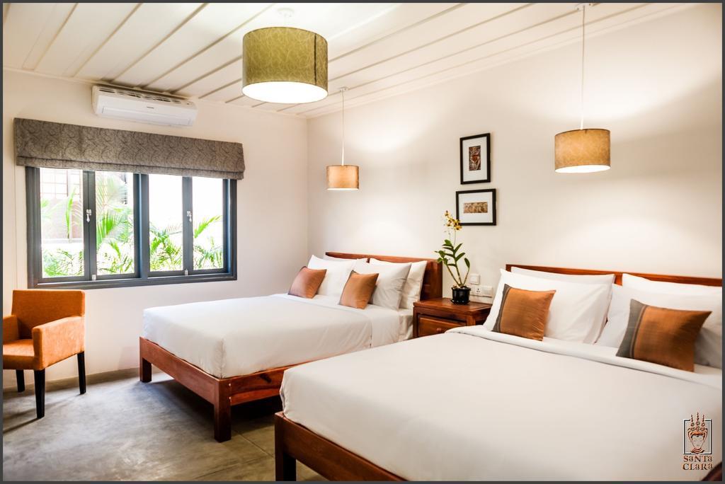 Santa Clara Boutique Hotel Ciudad de Siem Riep Habitación foto