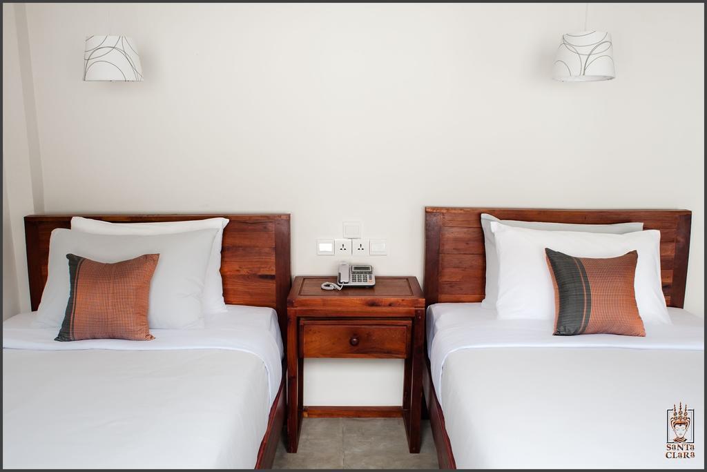 Santa Clara Boutique Hotel Ciudad de Siem Riep Habitación foto